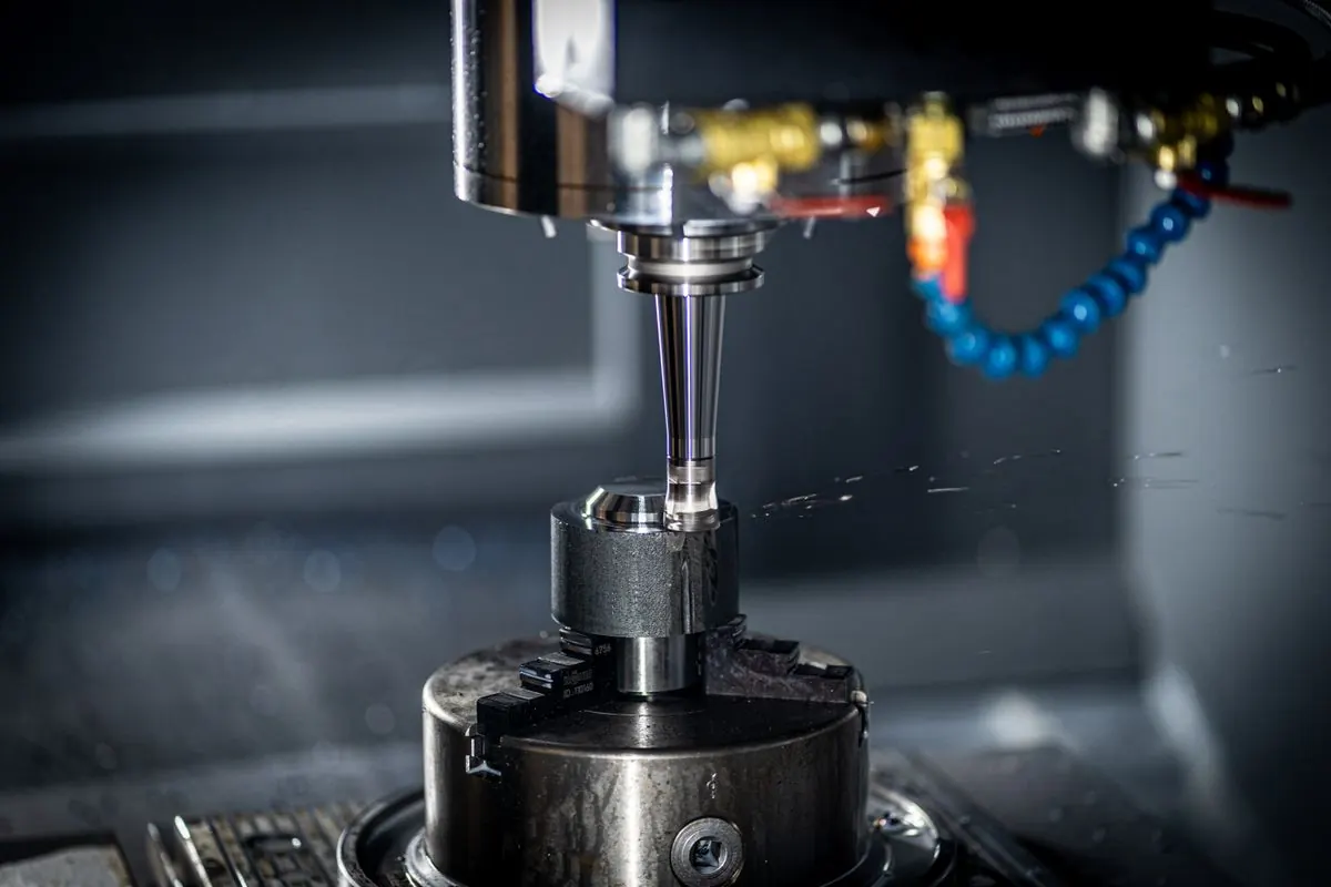 CNC machining center cutting a part